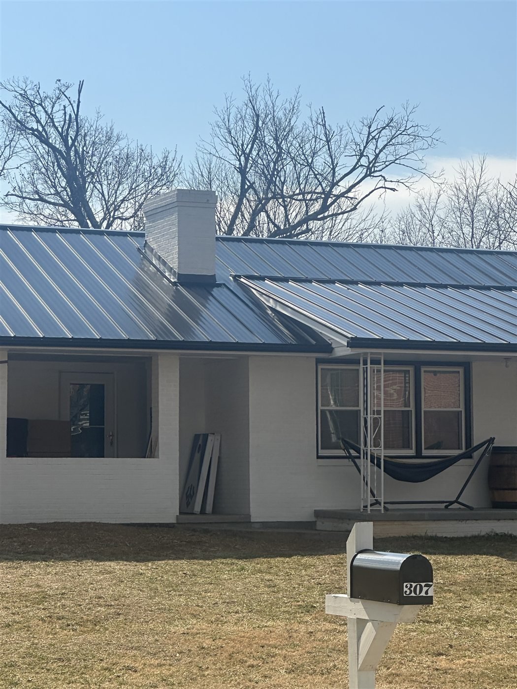 Metal roof on a Valley farmhouse, completed by Seaman Roofing